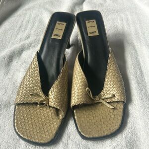 Women’s stylish slides by Cem, size 10.